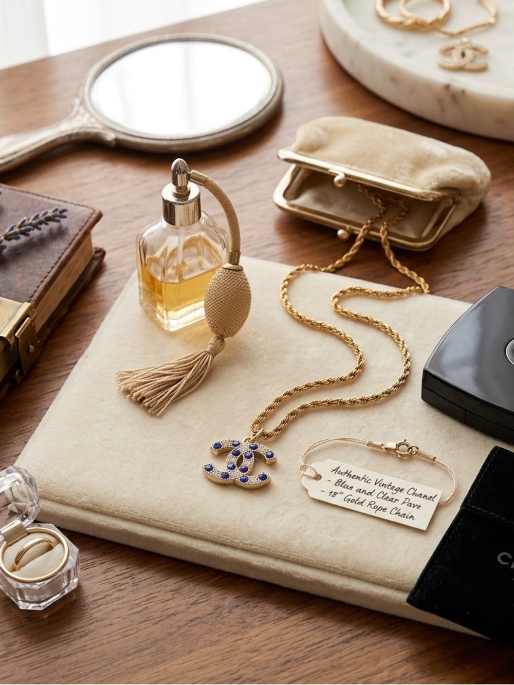 CHANEL EUC double C gold tone 
blue & clear rhinestone 
18” titanium gold rope